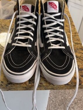 Vans Black and White High-Top Skate Sneakers